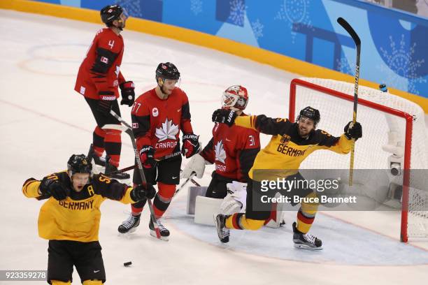 Patrick Hager of Germany reacts after scoring a goal against Canada in the second period during the Men's Play-offs Semifinals on day fourteen of the...