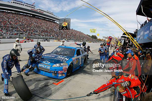 Martin Truex Jr., driver of the Vaseline MEN Body Lotion Chevrolet, comes in for a pit stop during the NASCAR Sprint Cup Series TUMS Fast Relief 500...