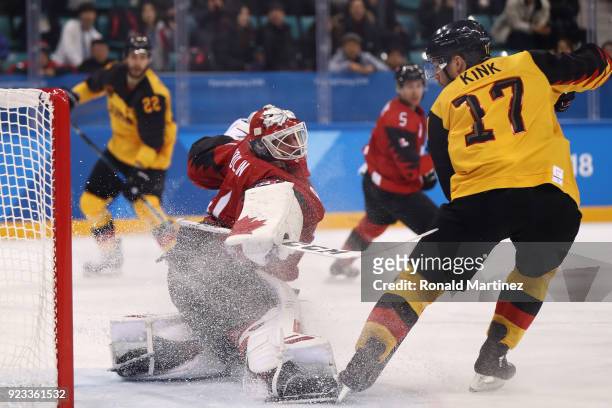 Kevin Poulin of Canada makes a save against Marcus Kink of Germany in the second period during the Men's Play-offs Semifinals on day fourteen of the...