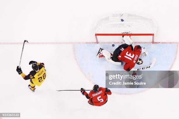 Frank Mauer of Germany scores a goal in the second perios against Kevin Poulin of Canada during the Men's Play-offs Semifinals on day fourteen of the...