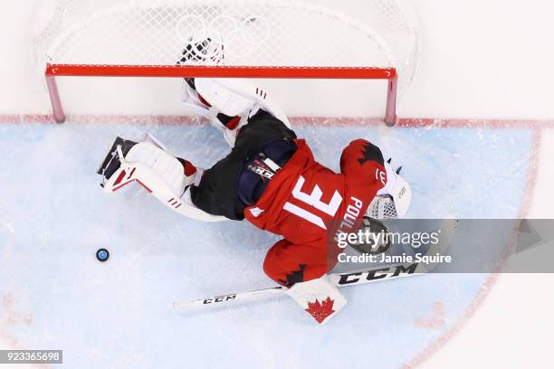 Kevin Poulin of Canada reacts to a goal by Frank Mauer of Germany in the second period during the Men's Play-offs Semifinals on day fourteen of the...