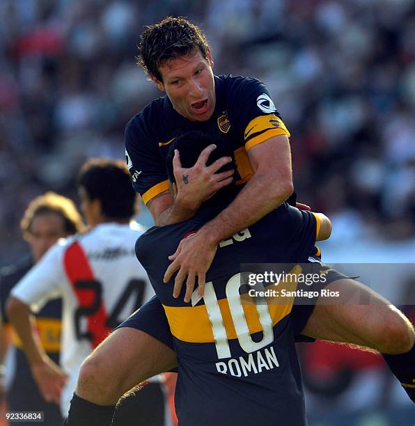 Boca Junior´s Martin Palermo celebrates with Juan Roman Riquelme a scored goal during their Argentinean Championship Primera A match against River...