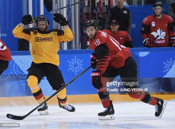 Canada's Marc-Andre Gragnani controls the puck in the men's semi-final ice hockey match between Canada and Germany during the Pyeongchang 2018 Winter...