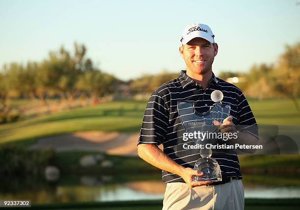 Troy Matteson poses with the winner's trophy after winning the Frys.com Open in a fourth round 2 hole playoff at Grayhawk Golf Club on October 25,...