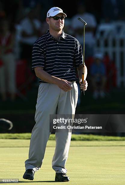 Troy Matteson reacts after missing a par putt on the 18th hole green during the fourth round of the Frys.com Open at Grayhawk Golf Club on October...