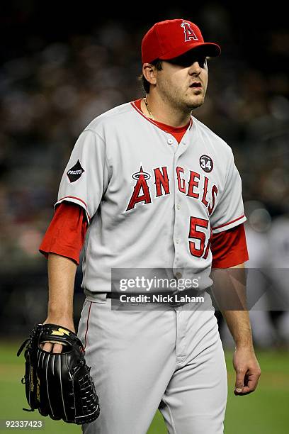 Joe Saunders of the Los Angeles Angels of Anaheim reacts while pitching against the New York Yankees in the first inning of Game Six of the ALCS...