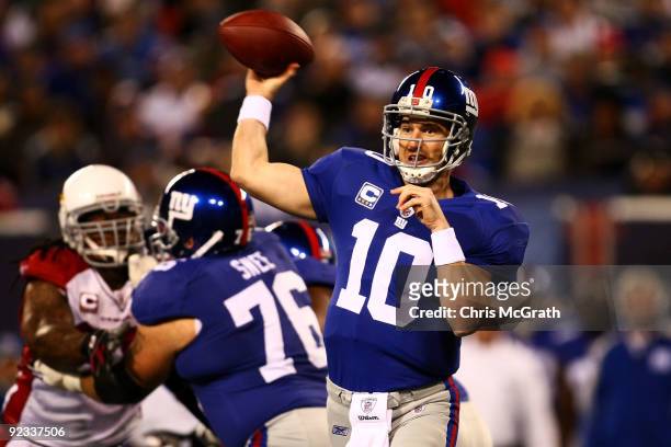 Eli Manning of the New York Giants throws a pass against the Arizona Cardinals on October 25, 2009 at Giants Stadium in East Rutherford, New Jersey.