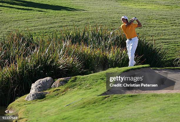 Rickie Fowler hits his second shot from the rough on the 18th hole during the fourth round of the Frys.com Open at Grayhawk Golf Club on October 25,...