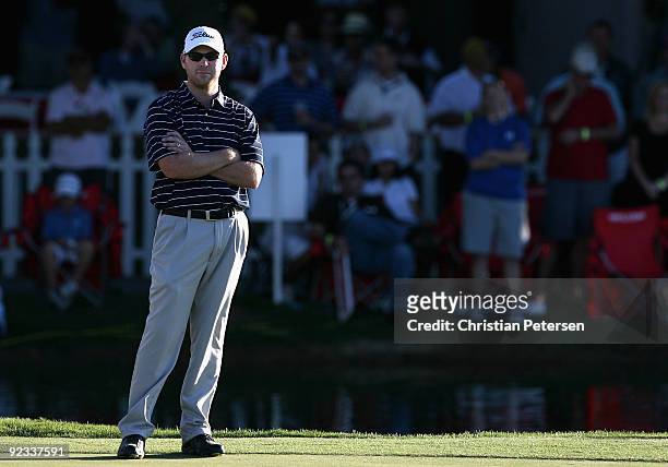 Troy Matteson stands on the 18th hole green during the fourth round of the Frys.com Open at Grayhawk Golf Club on October 25, 2009 in Scottsdale,...