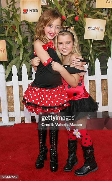 Actresses Noah Cyrus and Emily Grace Reaves arrives at camp Ronald McDonald for good times 17th annual Halloween Carnival at Universal Studios...