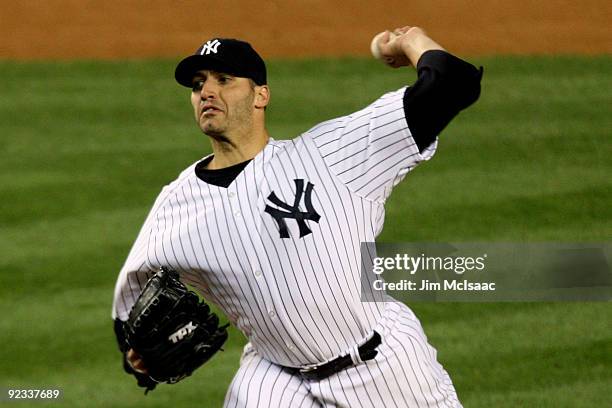 Andy Pettitte of the New York Yankees pitches against the Los Angeles Angels of Anaheim in the top of the third inning of Game Six of the ALCS during...