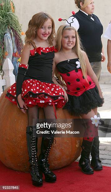 Actresses Noah Cyrus and Emily Grace Reaves arrives at camp Ronald McDonald for good times 17th annual Halloween Carnival at Universal Studios...