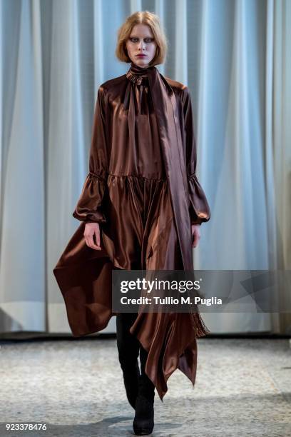 Model walks the runway at the Grinko show during Milan Fashion Week Fall/Winter 2018/19 on February 23, 2018 in Milan, Italy.