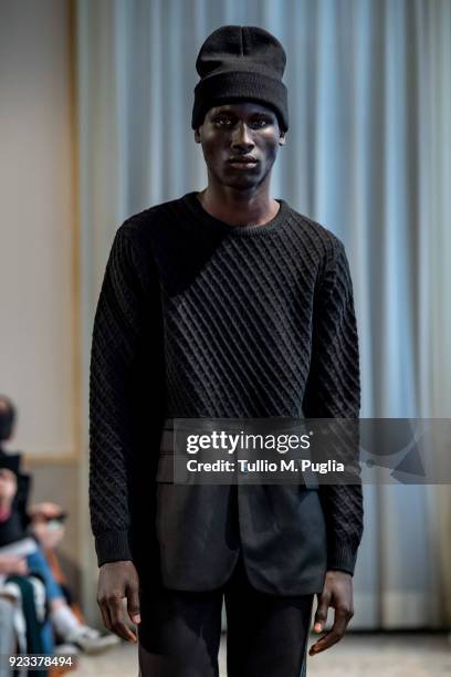 Model walks the runway at the Grinko show during Milan Fashion Week Fall/Winter 2018/19 on February 23, 2018 in Milan, Italy.