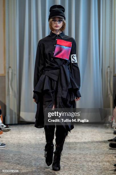 Model walks the runway at the Grinko show during Milan Fashion Week Fall/Winter 2018/19 on February 23, 2018 in Milan, Italy.