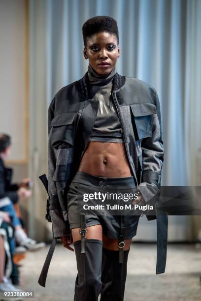Model walks the runway at the Grinko show during Milan Fashion Week Fall/Winter 2018/19 on February 23, 2018 in Milan, Italy.