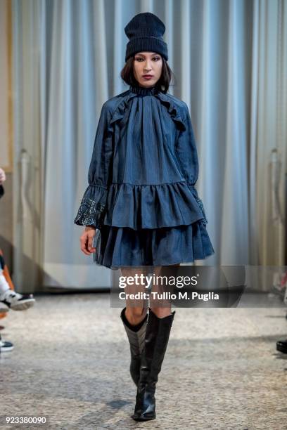 Model walks the runway at the Grinko show during Milan Fashion Week Fall/Winter 2018/19 on February 23, 2018 in Milan, Italy.