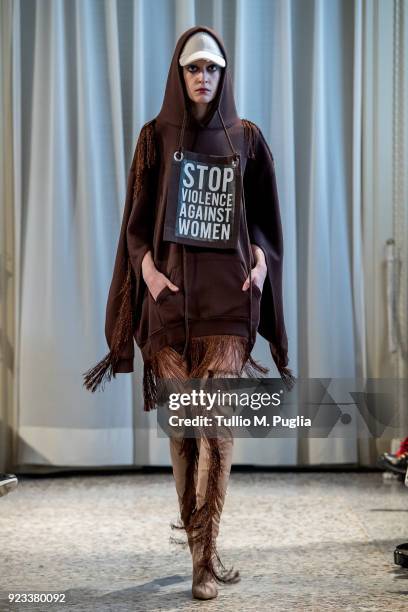 Model walks the runway at the Grinko show during Milan Fashion Week Fall/Winter 2018/19 on February 23, 2018 in Milan, Italy.