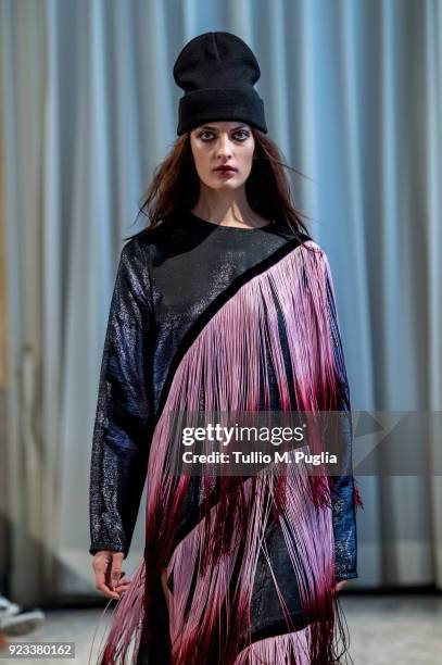 Model walks the runway at the Grinko show during Milan Fashion Week Fall/Winter 2018/19 on February 23, 2018 in Milan, Italy.