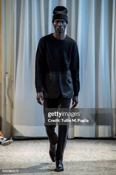 Model walks the runway at the Grinko show during Milan Fashion Week Fall/Winter 2018/19 on February 23, 2018 in Milan, Italy.