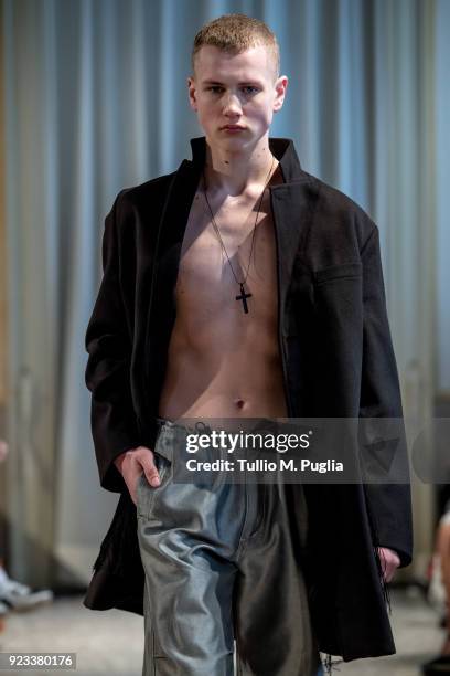 Model walks the runway at the Grinko show during Milan Fashion Week Fall/Winter 2018/19 on February 23, 2018 in Milan, Italy.