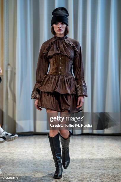 Model walks the runway at the Grinko show during Milan Fashion Week Fall/Winter 2018/19 on February 23, 2018 in Milan, Italy.