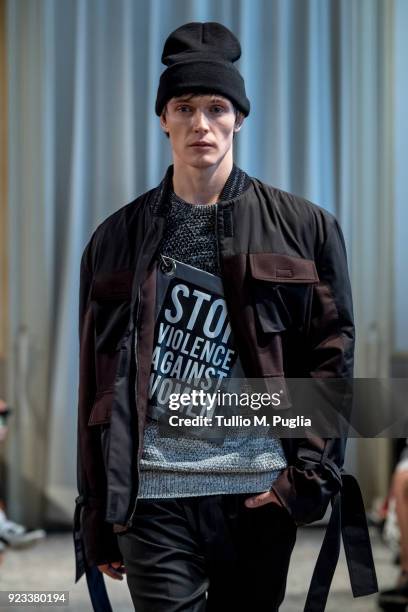 Model walks the runway at the Grinko show during Milan Fashion Week Fall/Winter 2018/19 on February 23, 2018 in Milan, Italy.