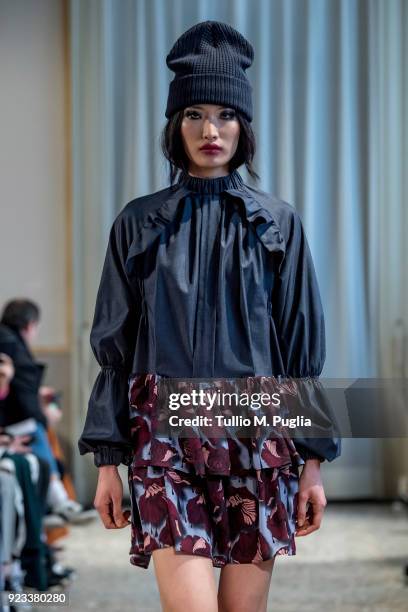 Model walks the runway at the Grinko show during Milan Fashion Week Fall/Winter 2018/19 on February 23, 2018 in Milan, Italy.