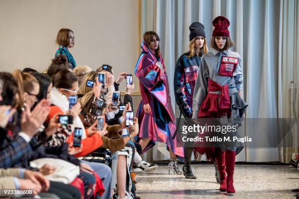 Models walk the runway at the Grinko show during Milan Fashion Week Fall/Winter 2018/19 on February 23, 2018 in Milan, Italy.