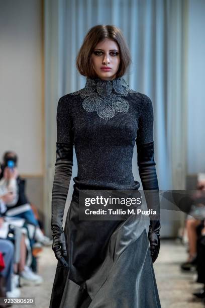 Model walks the runway at the Grinko show during Milan Fashion Week Fall/Winter 2018/19 on February 23, 2018 in Milan, Italy.