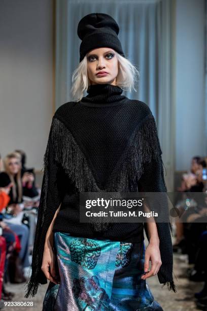 Model walks the runway at the Grinko show during Milan Fashion Week Fall/Winter 2018/19 on February 23, 2018 in Milan, Italy.