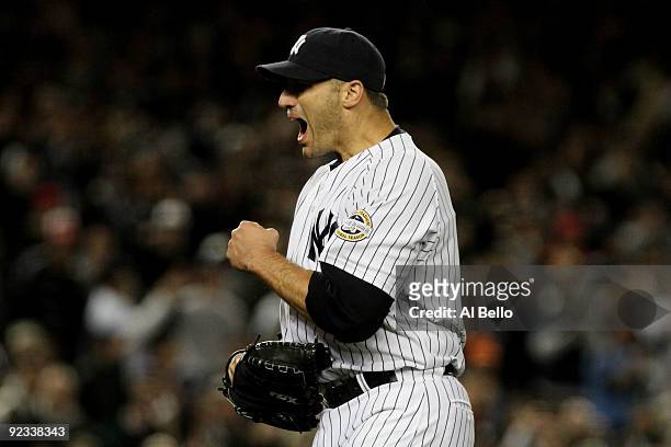 Andy Pettitte of the New York Yankees celebrates the end of the top of the sixth inning of Game Six of the ALCS against the Los Angeles Angels of...