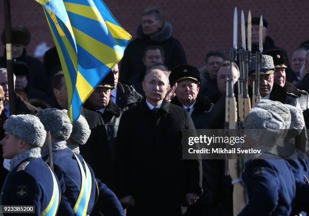 Russian President Vladimir Putin and Defence Minister Sergey Shoigu watch the military parade after a wreath laying ceremony to the Unknown Soldier...