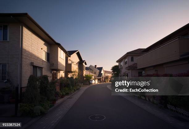 newly built neighbourhood in suburban osaka, japan - housing development photos et images de collection