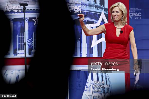 Radio Host Laura Ingraham waves after speaking at the Conservative Political Action Conference in National Harbor, Maryland, U.S., on Friday, Feb....