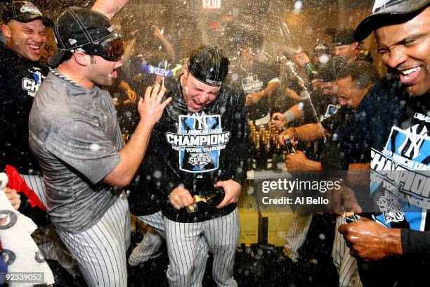 The New York Yankees celebrate their 5-2 victory over the Los Angeles Angels of Anaheim in Game Six of the ALCS during the 2009 MLB Playoffs at...