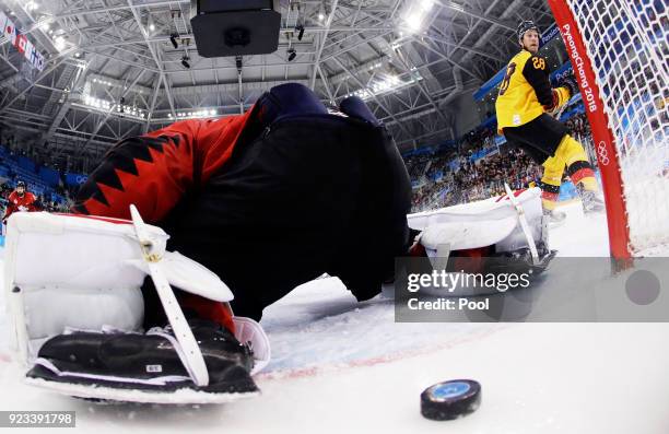 Frank Mauer of Germany celebrates a second period goal against Kevin Poulin of Canada during the Men's Play-offs Semifinals on day fourteen of the...