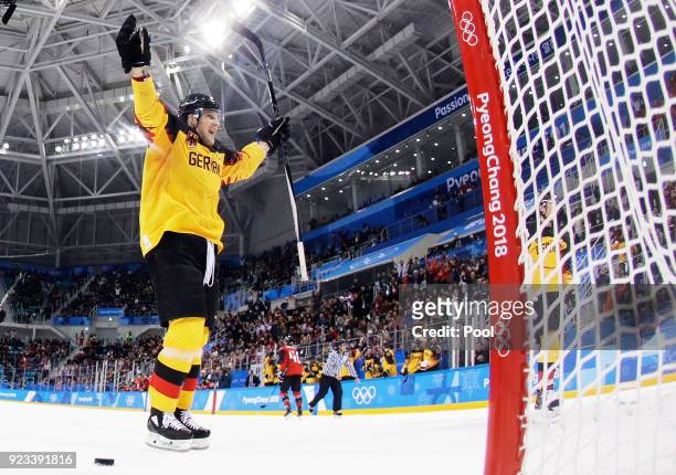 Frank Mauer of Germany celebrates a second period goal against Kevin Poulin of Canada during the Men's Play-offs Semifinals on day fourteen of the...