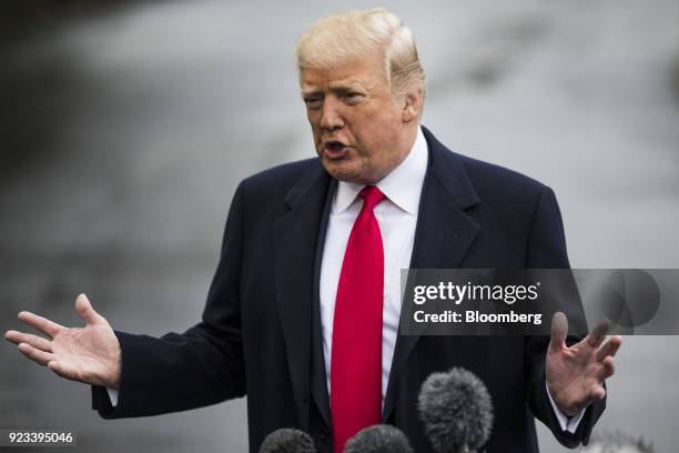 President Donald Trump speaks to members of the media before boarding Marine One for the Conservative Political Action Conference in Washington,...