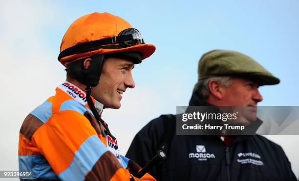 Jockey Sam Twiston Davies and Trainer Paul Nicholls look on at Exeter Racecourse on February 23, 2018 in Exeter, England.