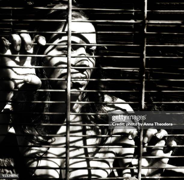 prisioner of one's own mind - woman prison stock pictures, royalty-free photos & images