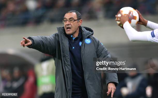 Head coach Maurizio Sarri of Napoli gestures during the UEFA Europa League Round of 32 match between RB Leipzig and Napoli at the Red Bull Arena on...