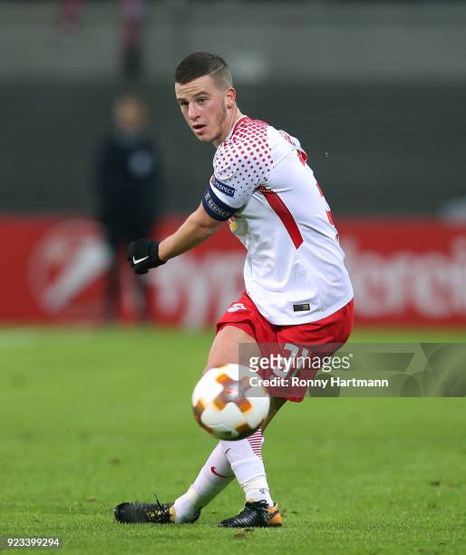 Diego Demme of Leipzig passes the ball during the UEFA Europa League Round of 32 match between RB Leipzig and Napoli at the Red Bull Arena on...