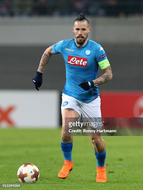 Marek Hamsik of Napoli runs with the ball during the UEFA Europa League Round of 32 match between RB Leipzig and Napoli at the Red Bull Arena on...