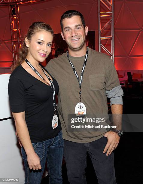 Actress Alyssa Milano and agent David Bugliari attend the BlackBerry VIP Hospitality Lounge at the U2 Concert at the Rose Bowl on October 25, 2009 in...