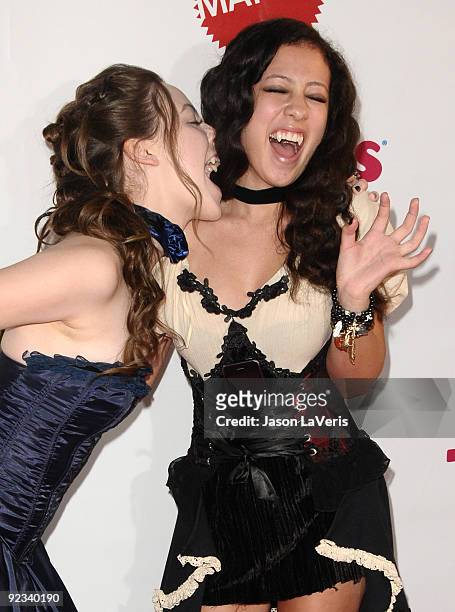 Actresses Brittany Curran and Keana Texeira attend the 16th annual Dream Halloween at Barkar Hangar on October 24, 2009 in Santa Monica, California.