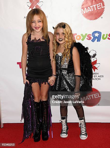 Actresses Noah Cyrus and Emily Grace Reaves attend the 16th annual Dream Halloween at Barkar Hangar on October 24, 2009 in Santa Monica, California.