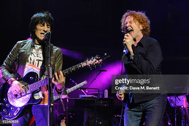 Ronnie Wood and Mick Hucknall perform during the Helping The Heart of Music Concert in aid of the PRS members benevolent fund starring the 'Faces'...