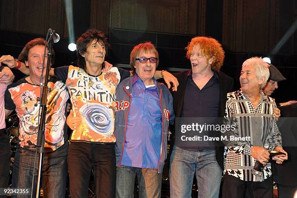 Kenny Jones , Ronnie Wood, Bill Wyman, Mick Hucknall and Ian McLagan perform during the Helping The Heart of Music Concert in aid of the PRS members...