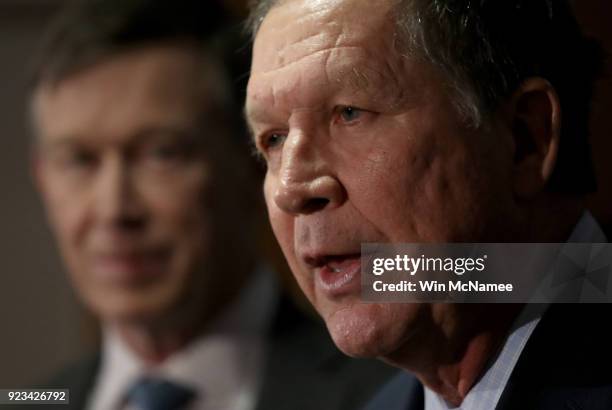 Gov. John Kasich speaks as Gov. John Hickenlooper listens during a press conference February 23, 2018 in Washington, DC. The three governors unveiled...